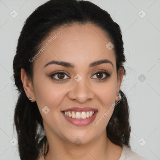 Joyful latino young-adult female with medium  brown hair and brown eyes