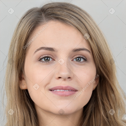 Joyful white young-adult female with long  brown hair and grey eyes