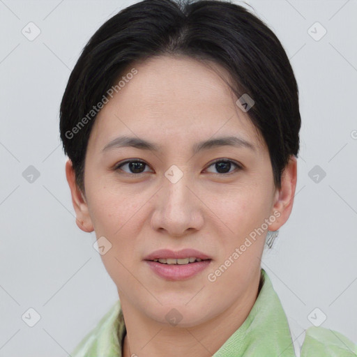 Joyful asian young-adult female with short  brown hair and brown eyes