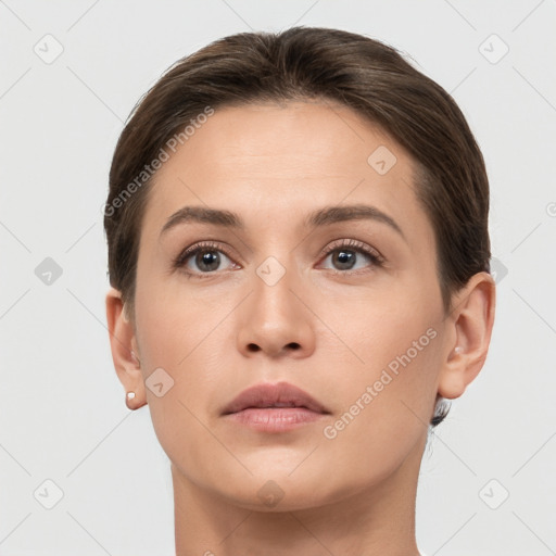 Neutral white young-adult female with short  brown hair and brown eyes