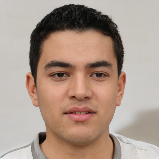 Neutral latino young-adult male with short  brown hair and brown eyes