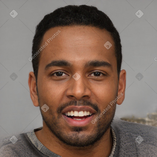 Joyful black young-adult male with short  black hair and brown eyes