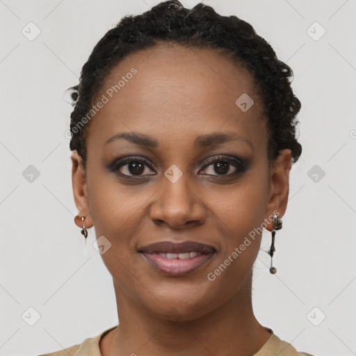 Joyful black young-adult female with short  brown hair and brown eyes