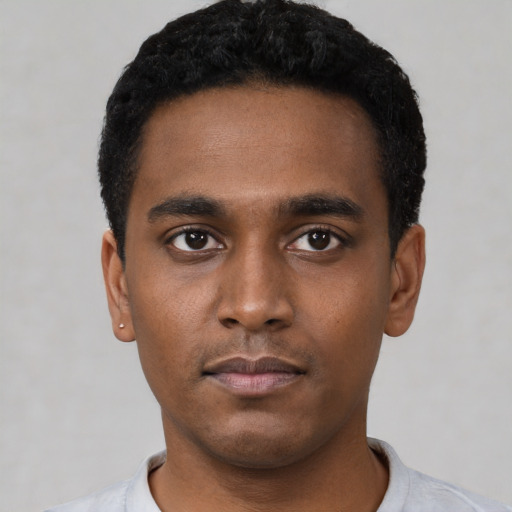 Neutral black young-adult male with short  black hair and brown eyes