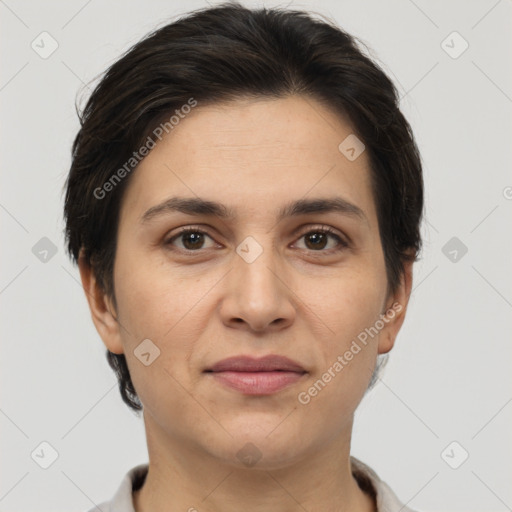 Joyful white adult female with short  brown hair and brown eyes