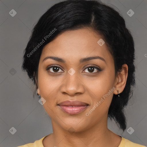 Joyful latino young-adult female with medium  black hair and brown eyes