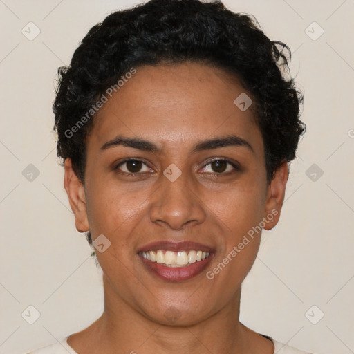 Joyful latino young-adult female with short  black hair and brown eyes