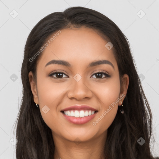 Joyful latino young-adult female with long  brown hair and brown eyes