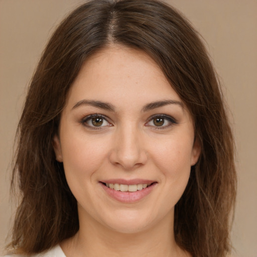 Joyful white young-adult female with medium  brown hair and brown eyes