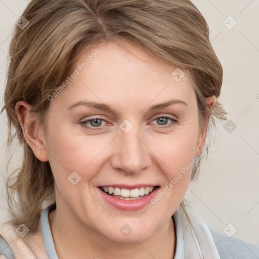 Joyful white young-adult female with medium  brown hair and blue eyes