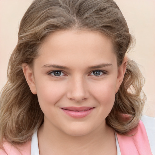 Joyful white child female with medium  brown hair and brown eyes