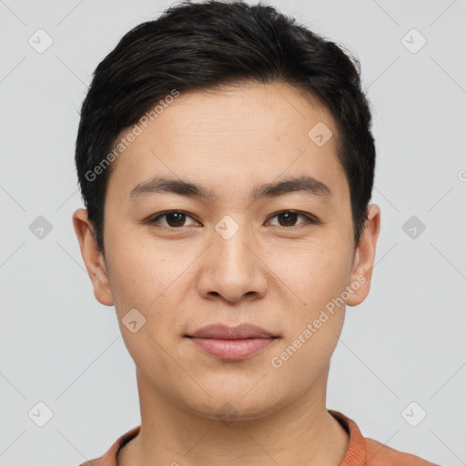 Joyful white young-adult male with short  black hair and brown eyes