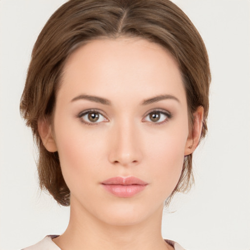 Neutral white young-adult female with medium  brown hair and brown eyes