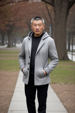 Chinese middle-aged male with  gray hair