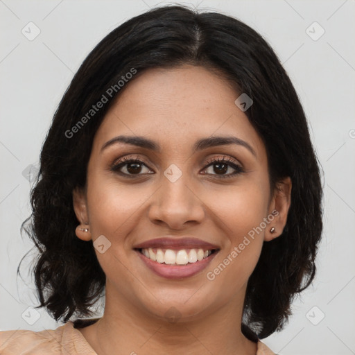 Joyful latino young-adult female with long  brown hair and brown eyes