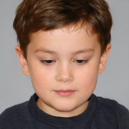 Neutral white child male with short  brown hair and brown eyes