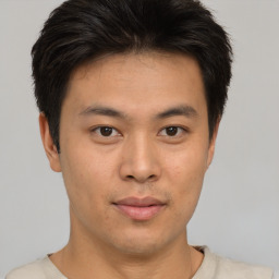 Neutral asian young-adult male with short  brown hair and brown eyes