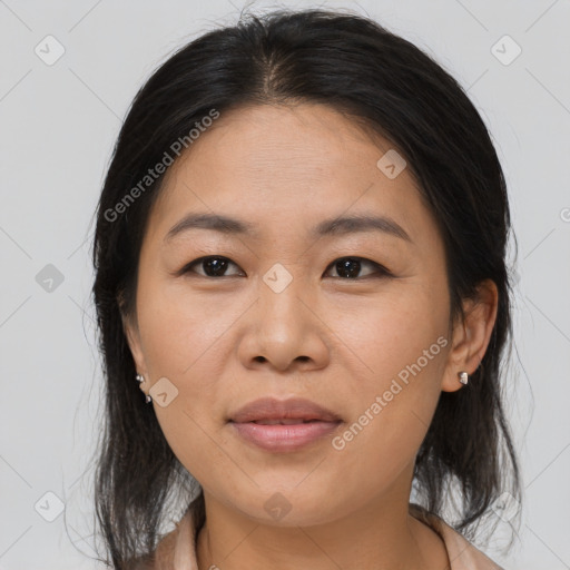 Joyful asian young-adult female with medium  brown hair and brown eyes