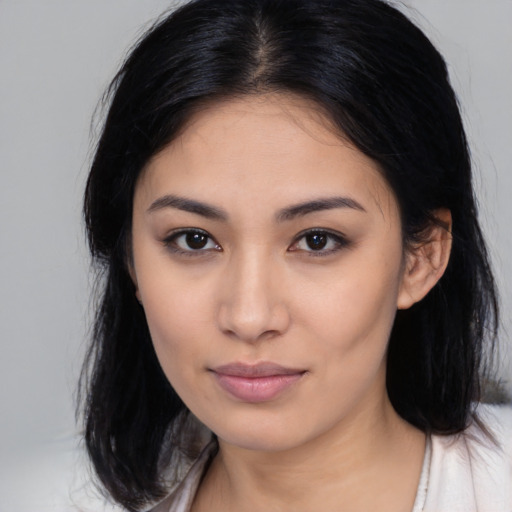 Neutral asian young-adult female with medium  black hair and brown eyes