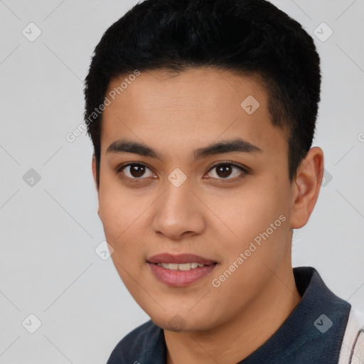 Joyful latino young-adult male with short  black hair and brown eyes