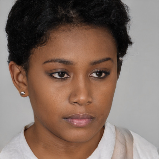 Neutral black young-adult female with short  brown hair and brown eyes