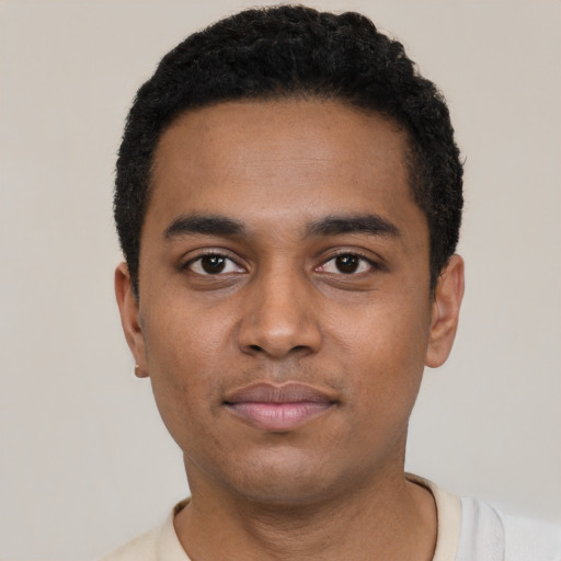 Neutral black young-adult male with short  black hair and brown eyes