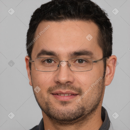 Joyful white adult male with short  brown hair and brown eyes