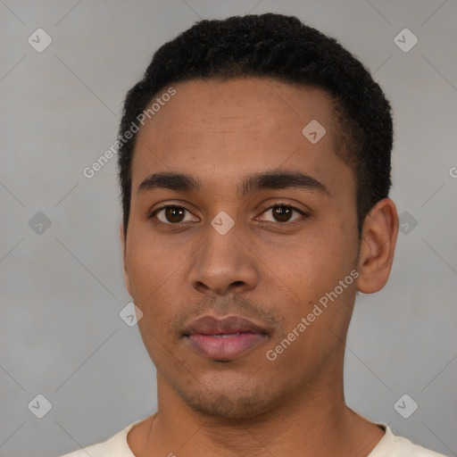 Neutral latino young-adult male with short  black hair and brown eyes