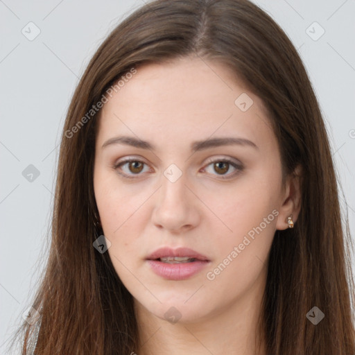 Neutral white young-adult female with long  brown hair and brown eyes