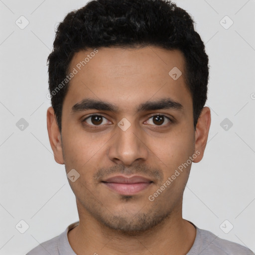 Neutral latino young-adult male with short  black hair and brown eyes