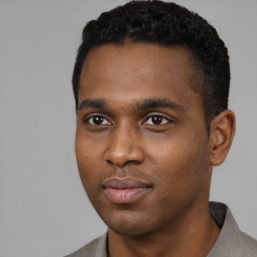 Neutral black young-adult male with short  black hair and brown eyes