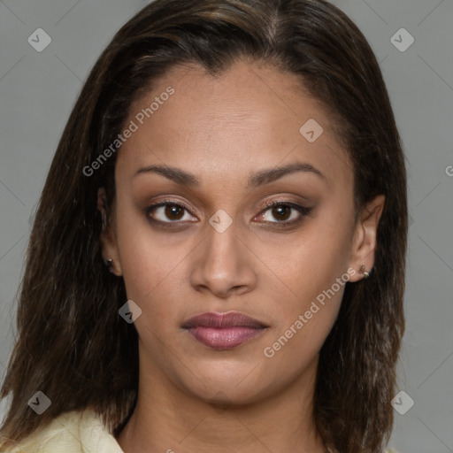 Joyful latino young-adult female with medium  brown hair and brown eyes