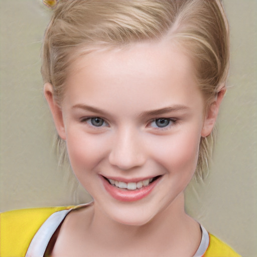 Joyful white child female with short  blond hair and grey eyes