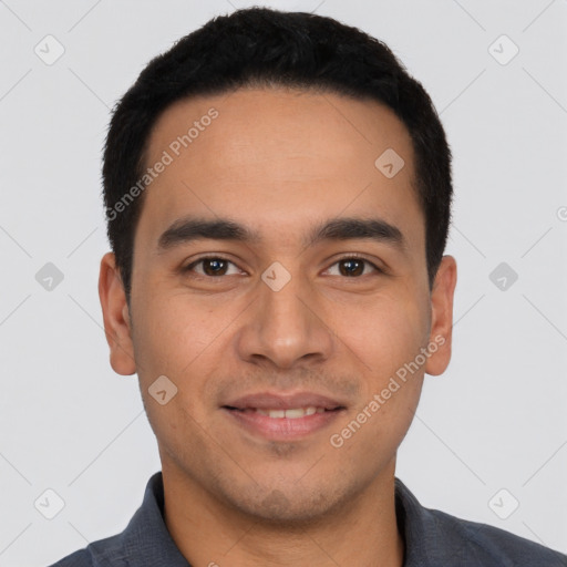 Joyful latino young-adult male with short  black hair and brown eyes