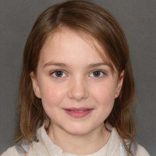 Joyful white child female with medium  brown hair and brown eyes