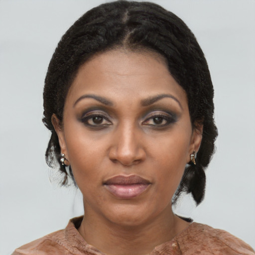 Neutral black young-adult female with short  black hair and brown eyes