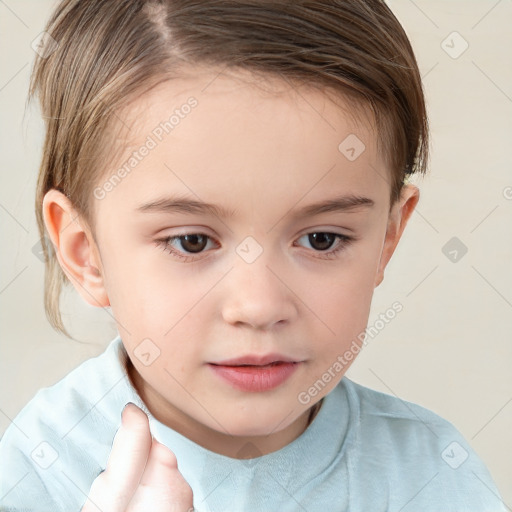 Joyful white child female with short  brown hair and brown eyes