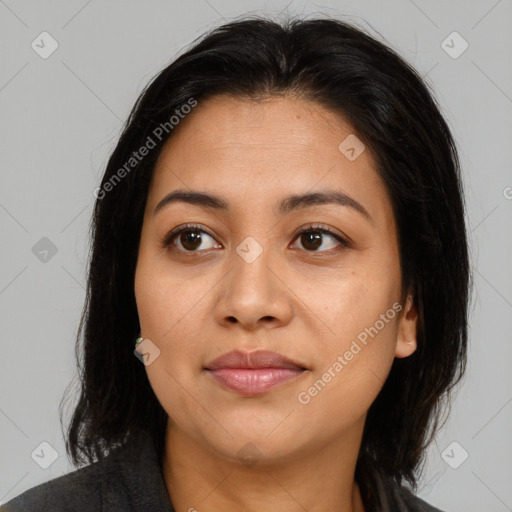 Joyful asian young-adult female with long  brown hair and brown eyes