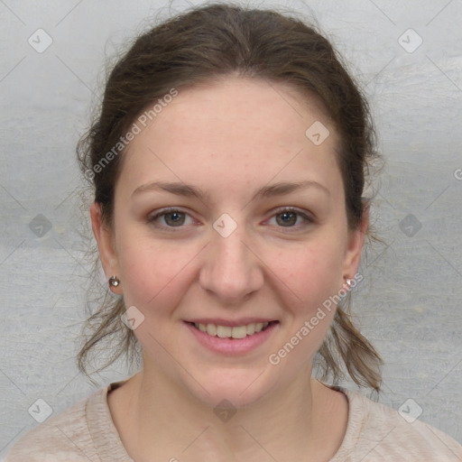 Joyful white young-adult female with medium  brown hair and blue eyes