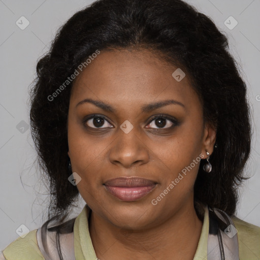 Joyful black young-adult female with long  brown hair and brown eyes