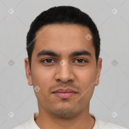 Neutral latino young-adult male with short  black hair and brown eyes