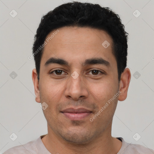 Joyful white young-adult male with short  black hair and brown eyes