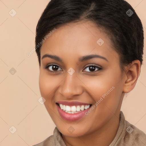 Joyful latino young-adult female with long  brown hair and brown eyes