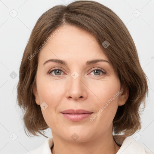 Joyful white young-adult female with medium  brown hair and green eyes