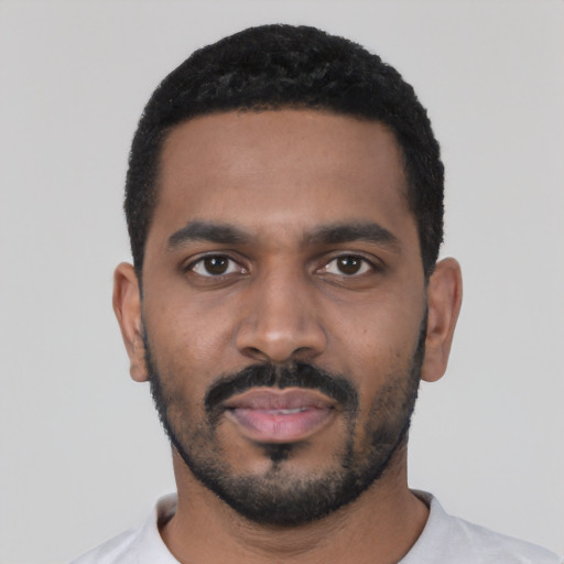 Neutral black young-adult male with short  black hair and brown eyes