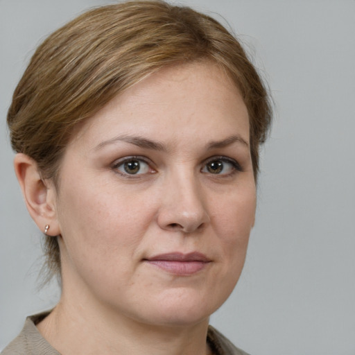 Neutral white young-adult female with medium  brown hair and grey eyes