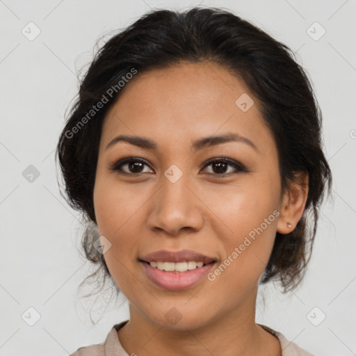 Joyful latino young-adult female with medium  brown hair and brown eyes