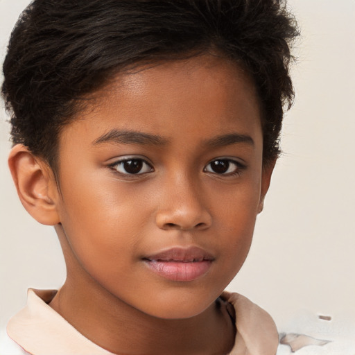 Joyful white child female with short  brown hair and brown eyes