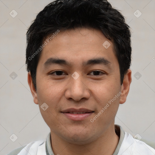 Joyful white young-adult male with short  black hair and brown eyes