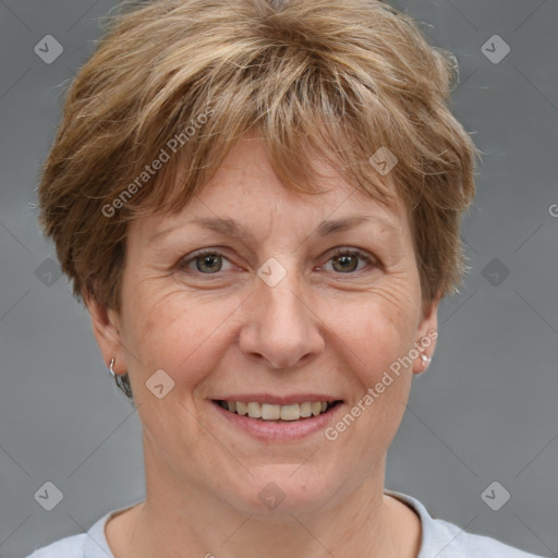 Joyful white adult female with short  brown hair and brown eyes